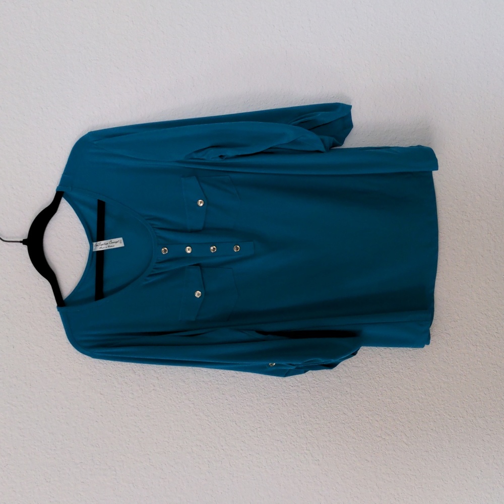Turquoise top with gold buttons